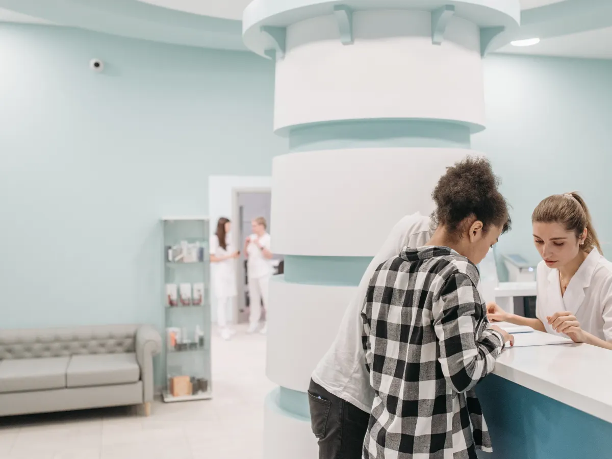 A professional review card at reception can invite feedback without disrupting patient care.