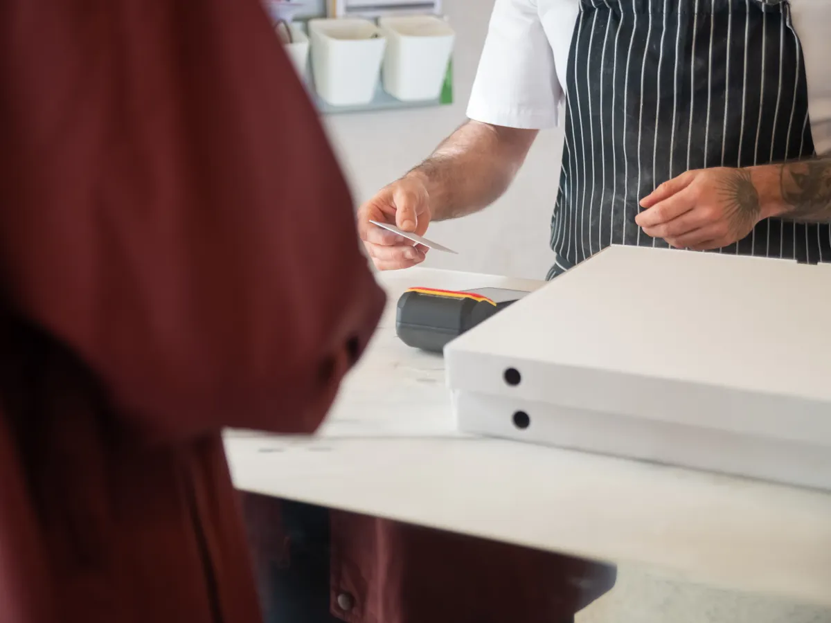 A simple card can sit near checkout, packaging, waiting areas or a service desk.